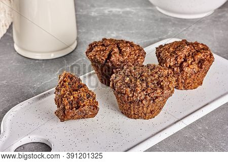 Healthy Breakfast. Carrot Vegan Muffins And Muesli Or Granola In White Bowl On Gray Stone Table. Kin