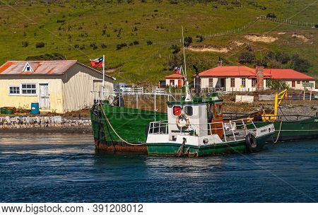 Riesco Island, Chile - December 12, 2008: Green And White Boats At Landing On Otway Sound Near Rio V