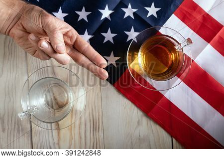 Concept Of Battling Each Other In Us Presidential Election. Two Glasses Opposite Each Other On Backg