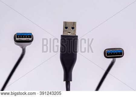 Usb Cable From Different Angles Isolated Against White Background.