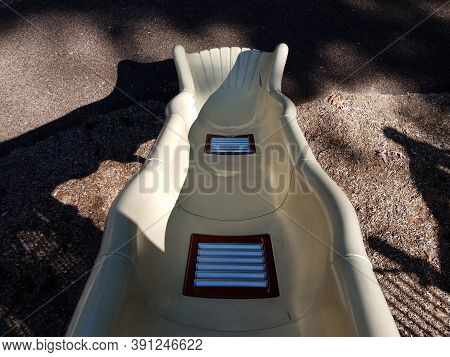 Metal Rollers On Plastic Slide To Make It Faster