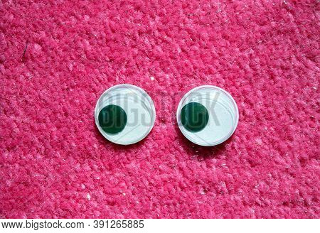 Funny Wiggle Google Eyes On Fabric Silly Fur Carpet Background