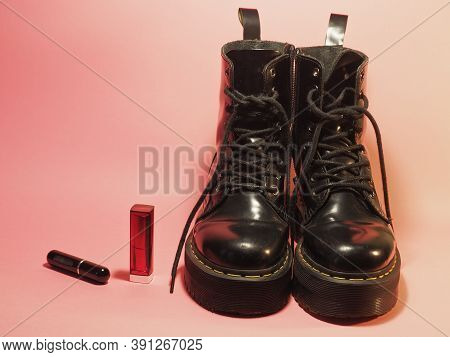 Black Women's Lace-up Boots With A Thick Sole And Lipstick.