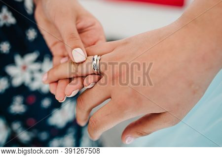 The Girl On The Bachelorette Shows Her Engagement Ring. Wedding Ring Of The Bride Close-up.