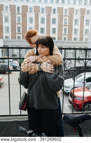 Ginger Man Hugging His Girlfriend From Behind, Buried His Face In Her Hair