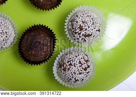 Dried Fruit And Nut Sweets. Some Are Sprinkled With Sesame Seeds. Made At Home In Self-isolation Dur