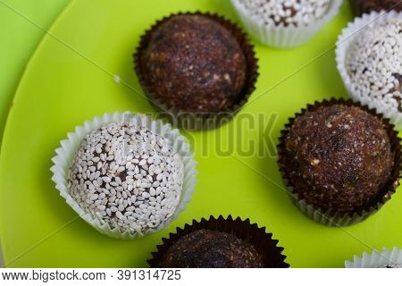 Dried Fruit And Nut Sweets. Some Are Sprinkled With Sesame Seeds. Made At Home In Self-isolation Dur