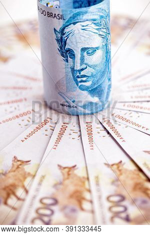 100 Reais Banknote And 200 Reais Banknotes, Money From Brazil, Conceptual Image For The Economy Of B