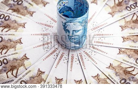 One Hundred Reais Banknote And Two Hundred Reais Banknotes, Money From Brazil, Conceptual Image For 