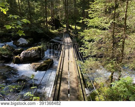 Small Pedestrian Bridges Over The Giessbach Stream And Between The Waterfalls Giessbach Falls (giess