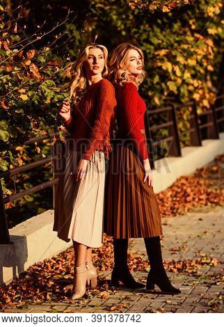 Colorful Fall Forest. Real Femininity. Autumn Women Outdoor. Girl Friends Walk In Park. Sunny Day Wi