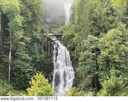 Giessbach Falls In The Eponymous Nature Park And Over Lake Brienz - Canton Of Bern, Switzerland