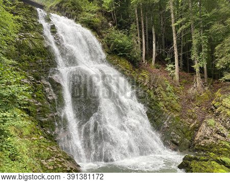 Giessbach Falls In The Eponymous Nature Park And Over Lake Brienz - Canton Of Bern, Switzerland