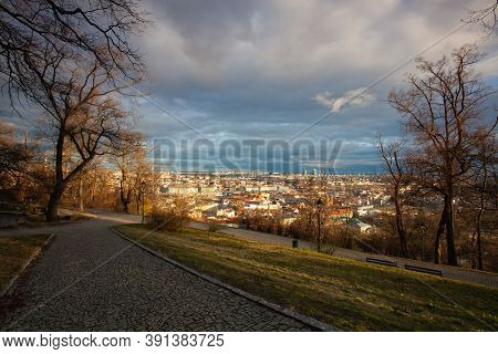 View From Petrin Park On Prague City At  Sunset, Czech Republic. Aerial Panoramic View Of The Histri