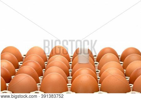 Brown Fresh Eggs In A Trey With A Mock Up Paper Chef Hat On One Of The Eggs.