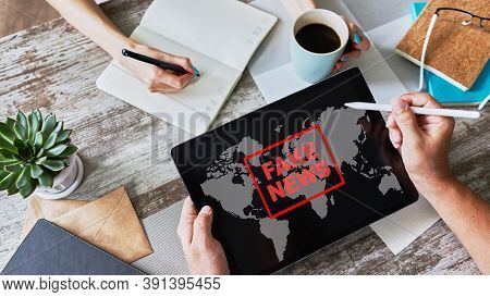Fake News Sign On Screen. Propaganda And Disinformation. Media And Internet Concept.