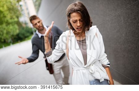 Breakup Of Couple With Man And Sad Girlfriend Outdoor. Divorce, Couple, Love, Pain Concept.