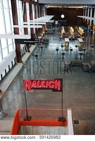 Raleigh,nc/usa - 3-21-2020: The Interior Of Union Station Train Depot In Raleigh, Nc, With A Neon Ra