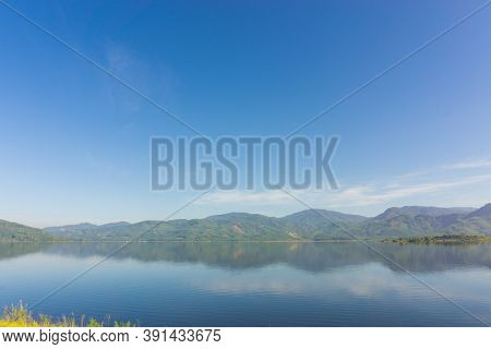 Scence Of Reservoir And Mountain