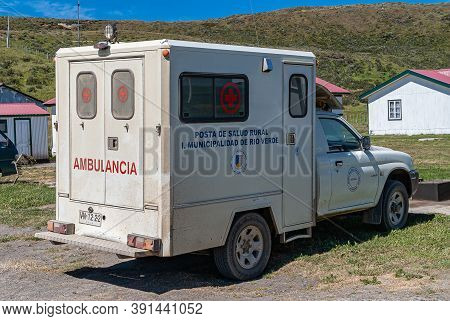 Riesco Island, Chile - December 12, 2008: White Ambulance Van With Blue And Red Texts Property Of Ri