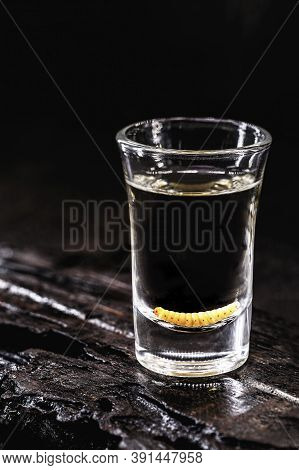 Shot Of Mezcal With Pepper Salt And Agave Worm, Mexican Drink In Mexico
