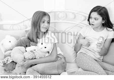 Kids Play Toys In Bed. Little Girls Spend Time Together. Teach Sister Sharing Toys. Greedy Sisters. 