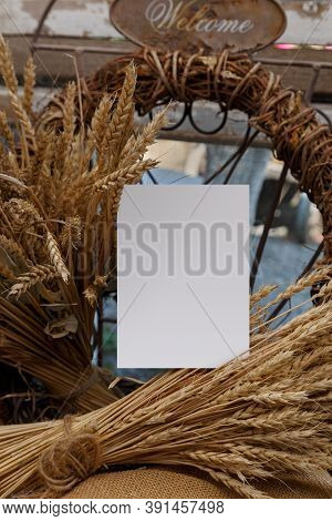 Postcard Mockup With Dry Wheat, Vintage Chair, Dried Wreath Of Herbs. Rystic Style. Empty Card With 