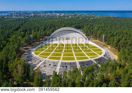 Riga, Latvia. August 10, 2020. Beautiful New Stadium Located In The Middle Of A Forest. Aerial View 