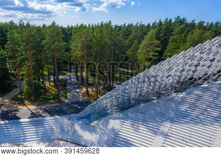 Riga, Latvia. August 10, 2020. Beautiful New Stadium Located In The Middle Of A Forest. Aerial View 