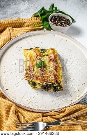 Cannelloni With Ricotta And Spinach. Italian Cuisine. Gray Background. Top View