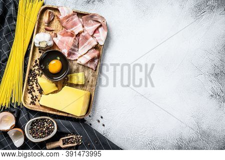 Traidtional Italian Pasta Carbonara Ingredients. Bacon, Spaghetti, Parmesan And Pecorino Cheese, Egg
