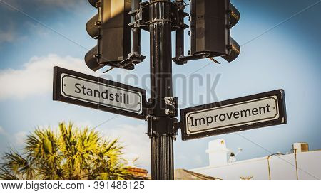 Street Sign The Direction Way To Improvement Versus Standstill