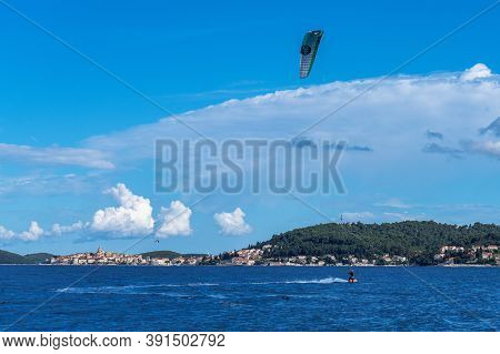 Viganj, Croatia - Jun 15, 2020: Unidentified Windsurfer At Viganj Beach With View At Korcula, Dalmat