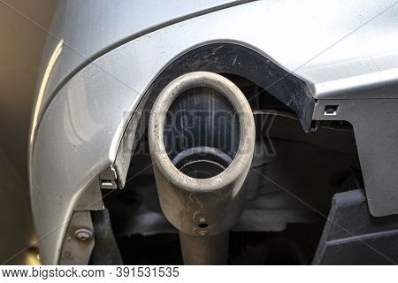 The Exhaust System In The Diesel Car Seen Up Close, View From Rear Of Muffler.