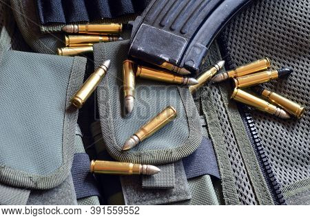 Ammunition 7,62*39.Tactical unloading vest as background. October 23, 2020.Kiev,Ukraine