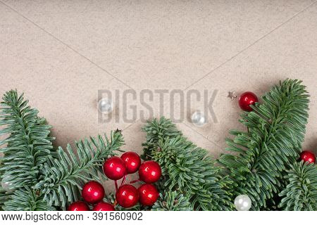 Traditional Green Christmas Tree Noble Fir Baubles Berries And Small Decor Border Frame On Craft Pap