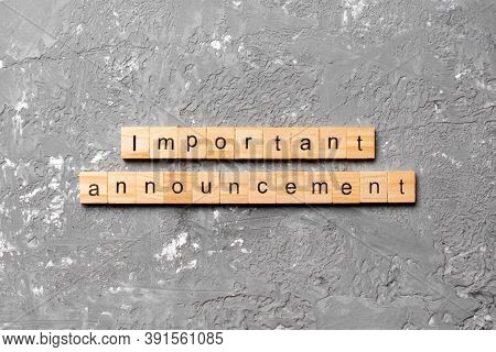 Important Announcement Word Written On Wood Block. Important Announcement Text On Cement Table For Y