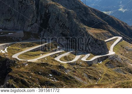 Tremola road on the Gotthard Pass in the Swiss mountains. Sunny day, nobody inside