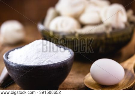 Clay Pot With Sugar Next To Free-range Eggs. Rustic Cuisine, Cooking, Candy Making