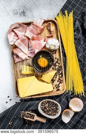 Traidtional Italian Pasta Carbonara Ingredients. Bacon, Spaghetti, Parmesan And Pecorino Cheese, Egg