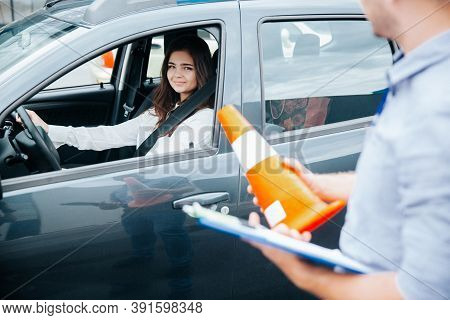 Positive Experience In Driving School. Cheerful Confident Young Woman Is Glad For Improvement Of Her