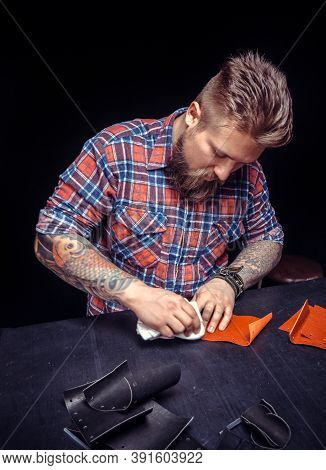 Leather Skinner Creates Quality Product Of Leather At His Leather Studio