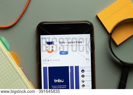 New York, Usa - 26 October 2020: Tribu Mobile App Logo On Phone Screen Close Up, Illustrative Editor
