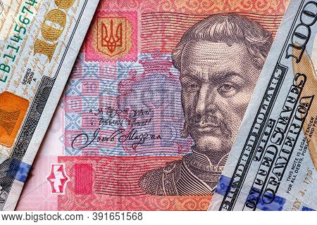 Ukrainian Money - Hryvnia Banknotes Usa Dollars Bills. Finance In Ukraine, Of The Hryvnia To The Dol