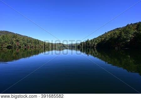 Autumn Landscape Reflections On Lake Santeetlah, North Carolina.