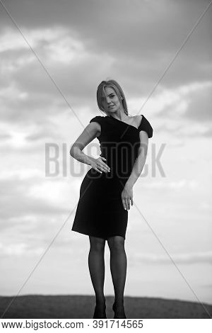 Summer Outdoor Porttrait Of Young Pretty Elegant Girl Posing At Roof At Sunset.
