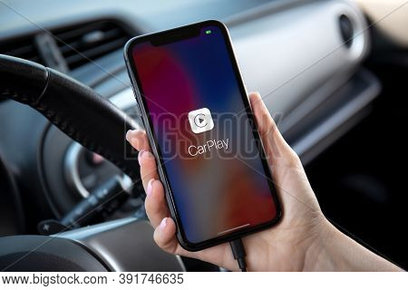 Alanya, Turkey - September 23, 2020: Woman Hands Holding Iphone 11 With Carplay In The Screen Phone 