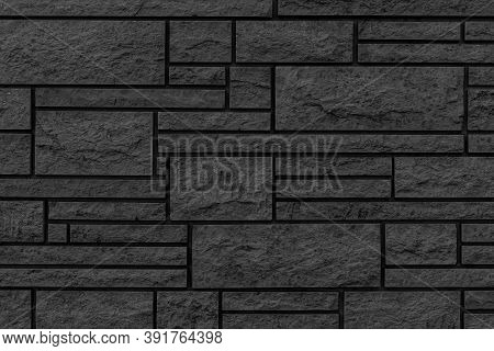 Block Pattern Of Black Stone Cladding Wall Tile Texture And Seamless Background