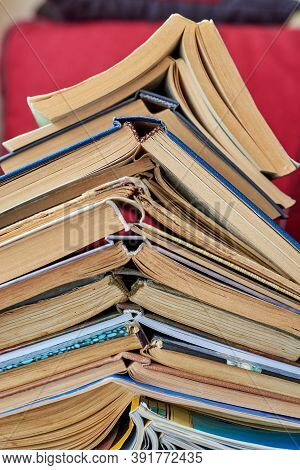 Old Books Piled Up In A Heap, Close-up, Learning And Education Concept.