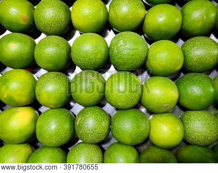 Sweet Lemon Arranged In Row For Sale In Fruits Juice Shop
